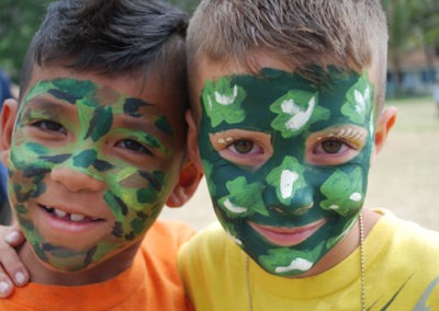 boys with camo face paint