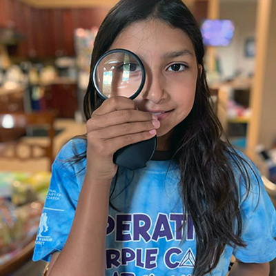 Camper with magnifying glass400px Girl with magnifying glass