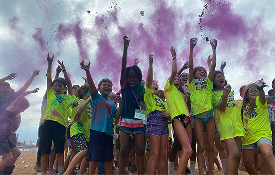 opc campers having a chalk fight550 OPC kids having a chalk fight