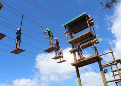 campers walking on ropes course challenge